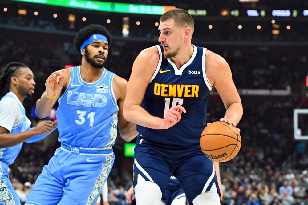 曼在首次报 曼在首次报